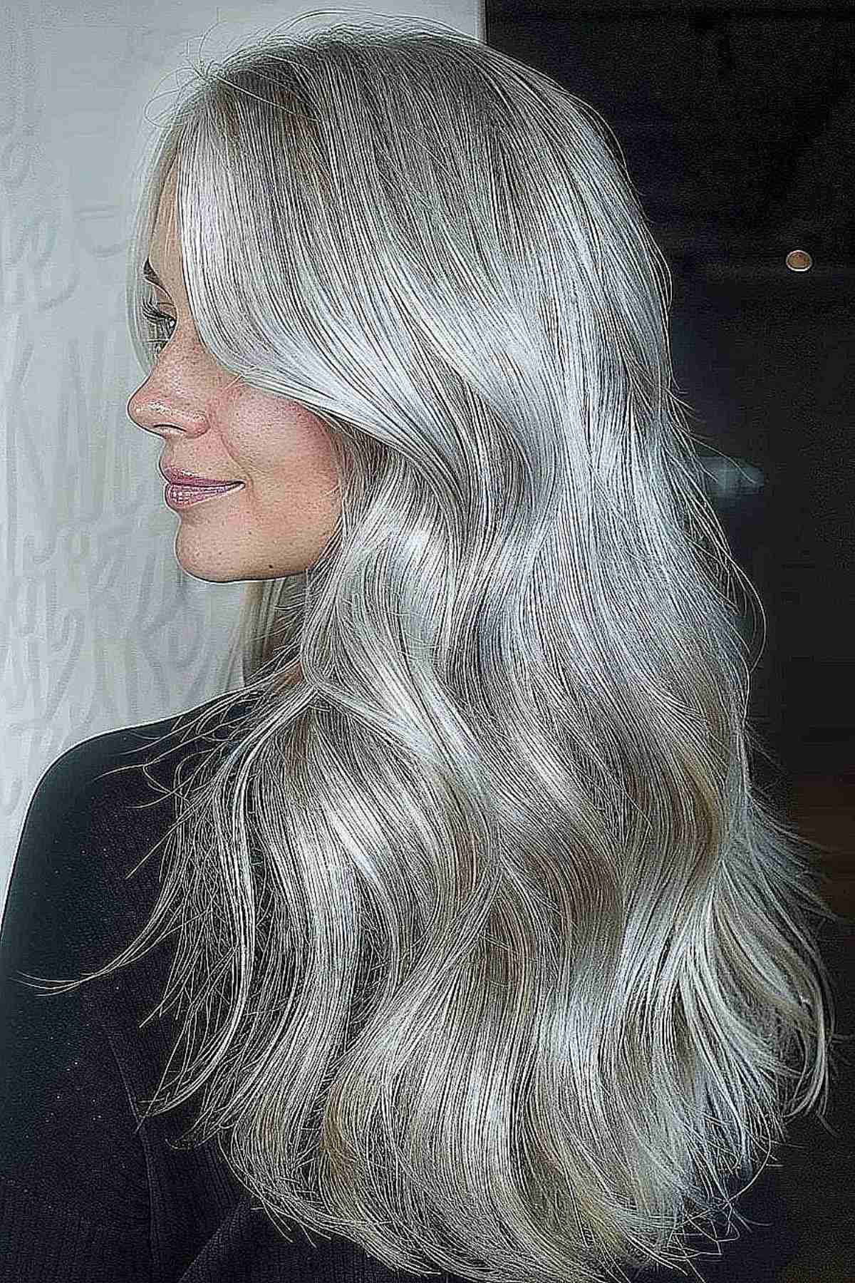 Long layered silver hair with multi-tonal waves