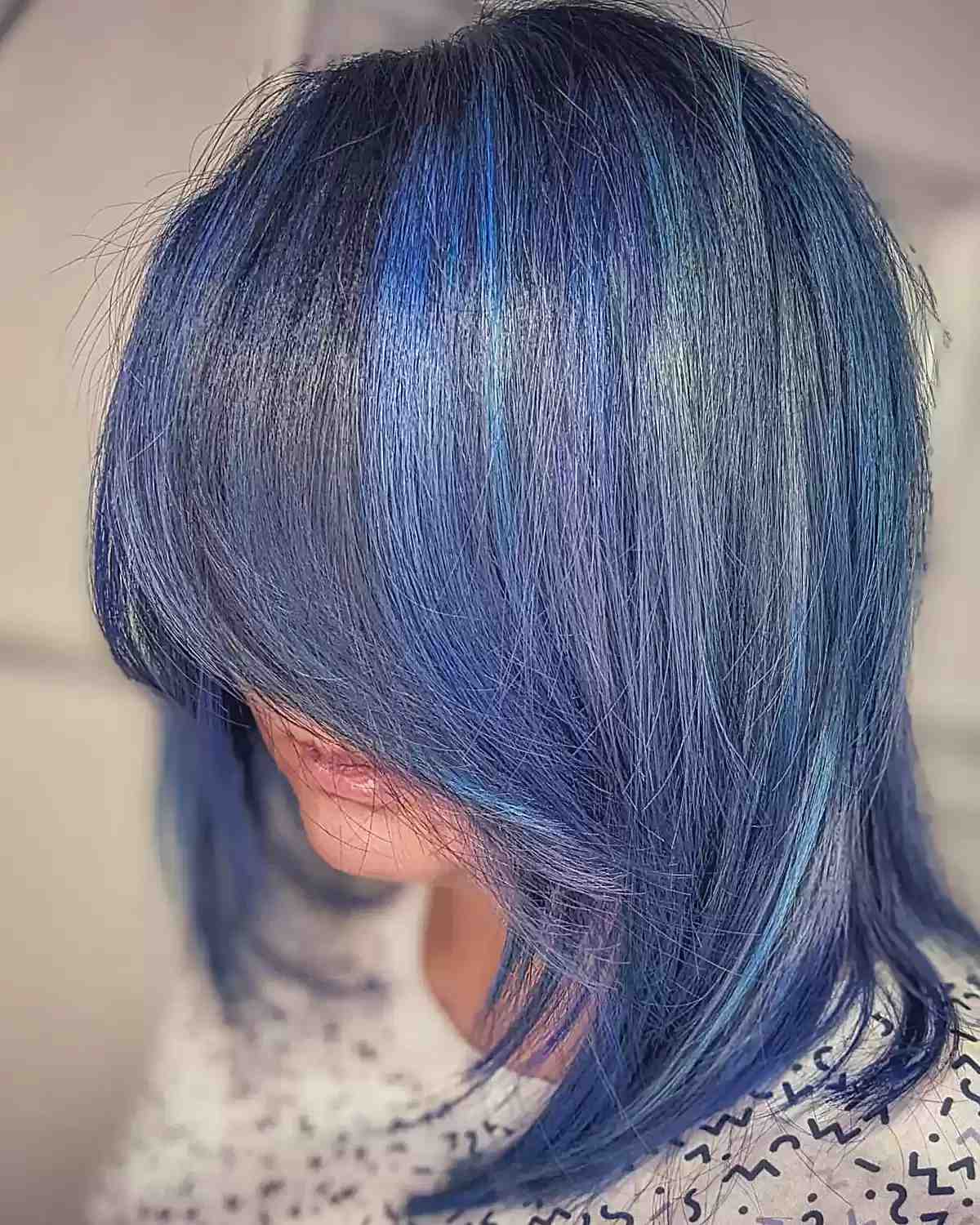 Muted Blue Balayage and Purple Hues on Shoulder-Length Layered Cut