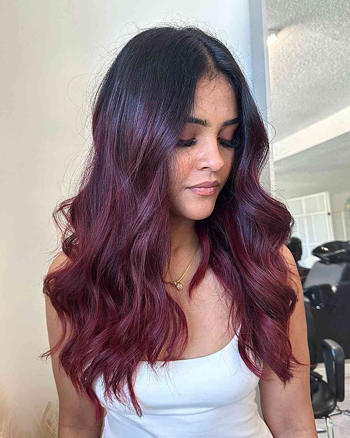Muted Burgundy Balayage Long Waves with Middle Part
