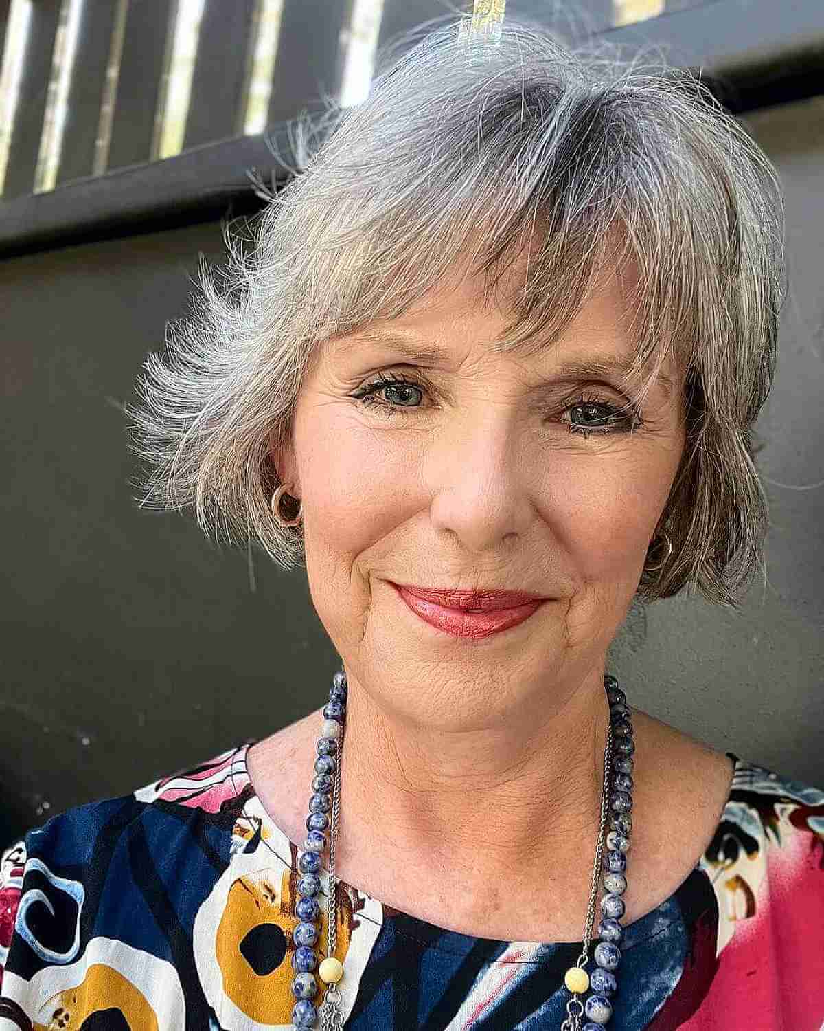 Natural Choppy Salt-and Pepper Bob Cut with Bangs for 70-Year-Olds
