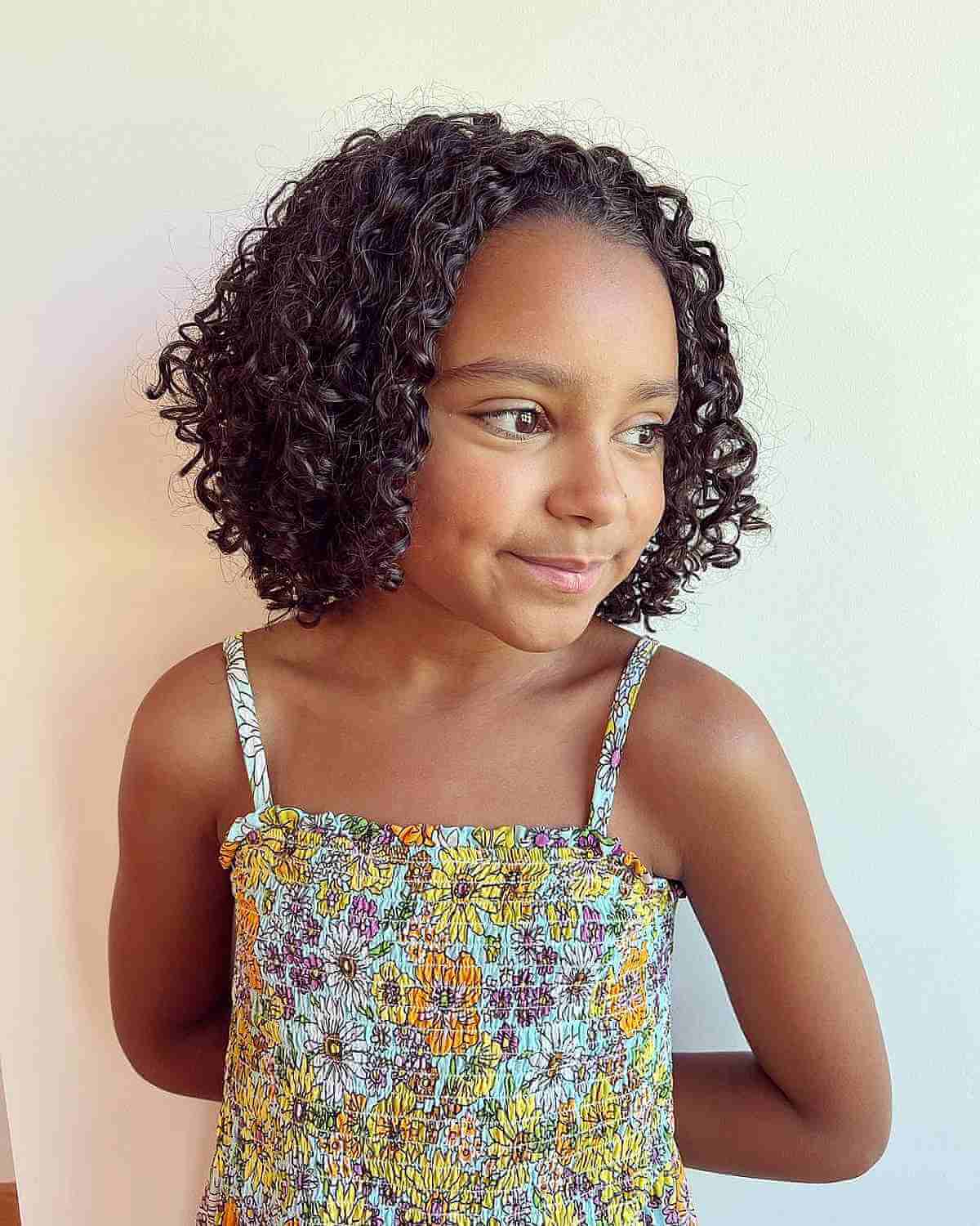 Natural curl cut girls with curly hair