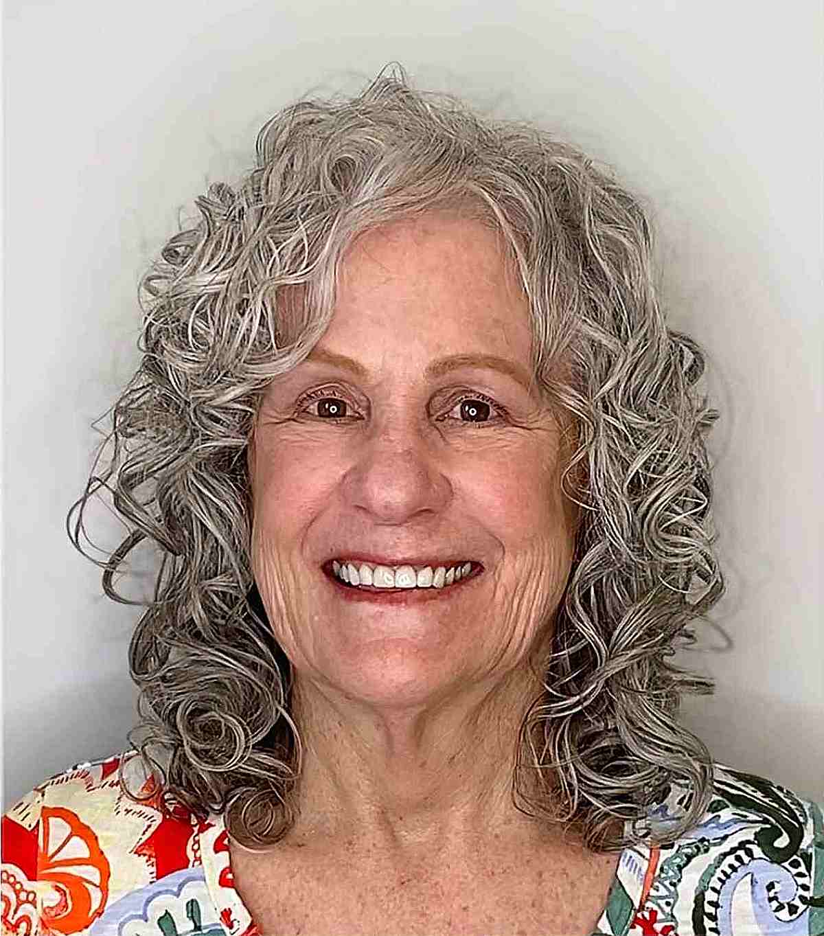 Natural Curls on a Lob for women in their 70s with thin hair