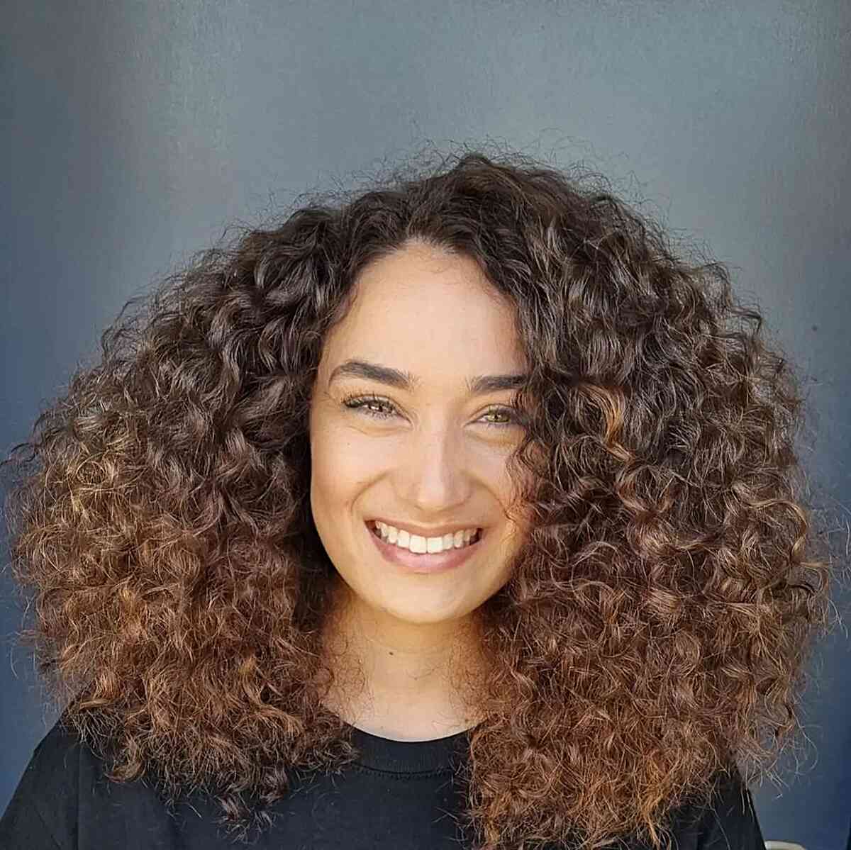 Natural Curly Voluminous Hair with texture and cut dry
