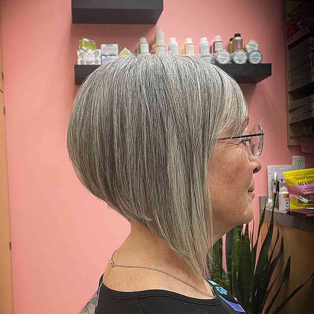 Natural Gray A-Line Bob with Bangs for Women Over Seventy with Glasses