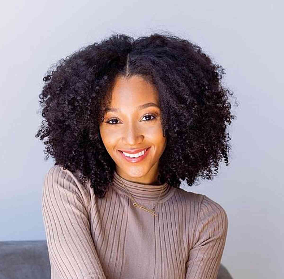 Shoulder-Grazing Natural Hairstyle with Middle-Parted Twist Out Curls