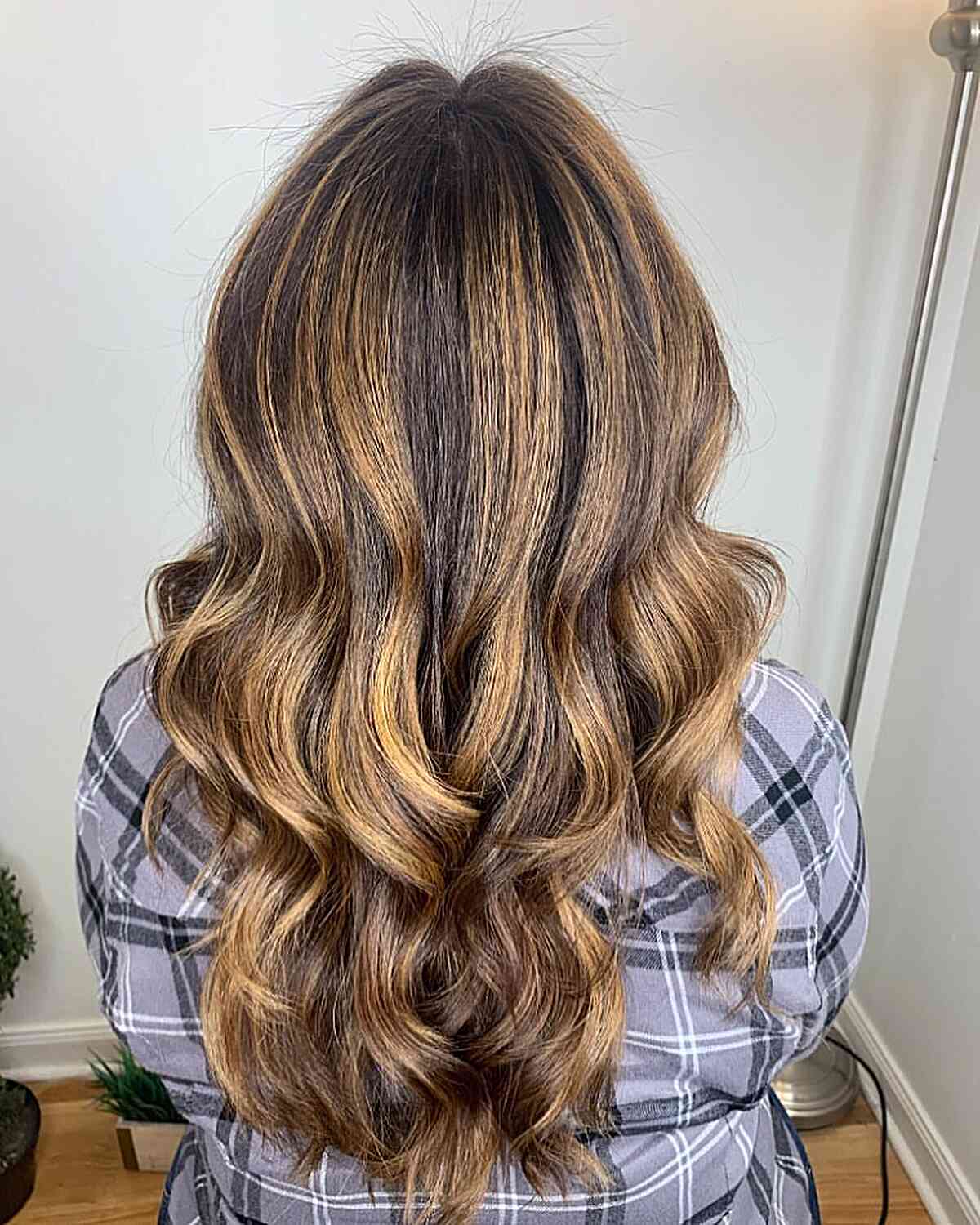 Natural looking brown hair with caramel highlights