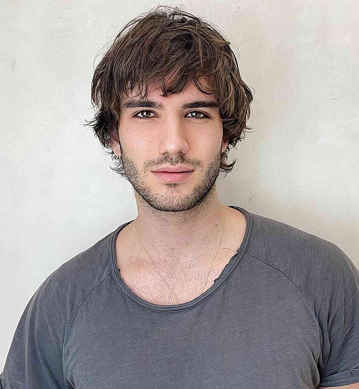 Natural Texture with Long Fringe on Medium-Length Hairstyle for Men