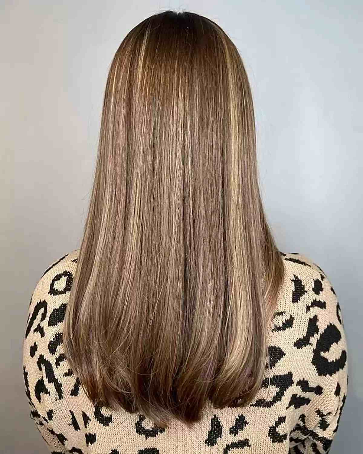 Subtle and Natural Golden Brown with Darker Roots on Straight Hair
