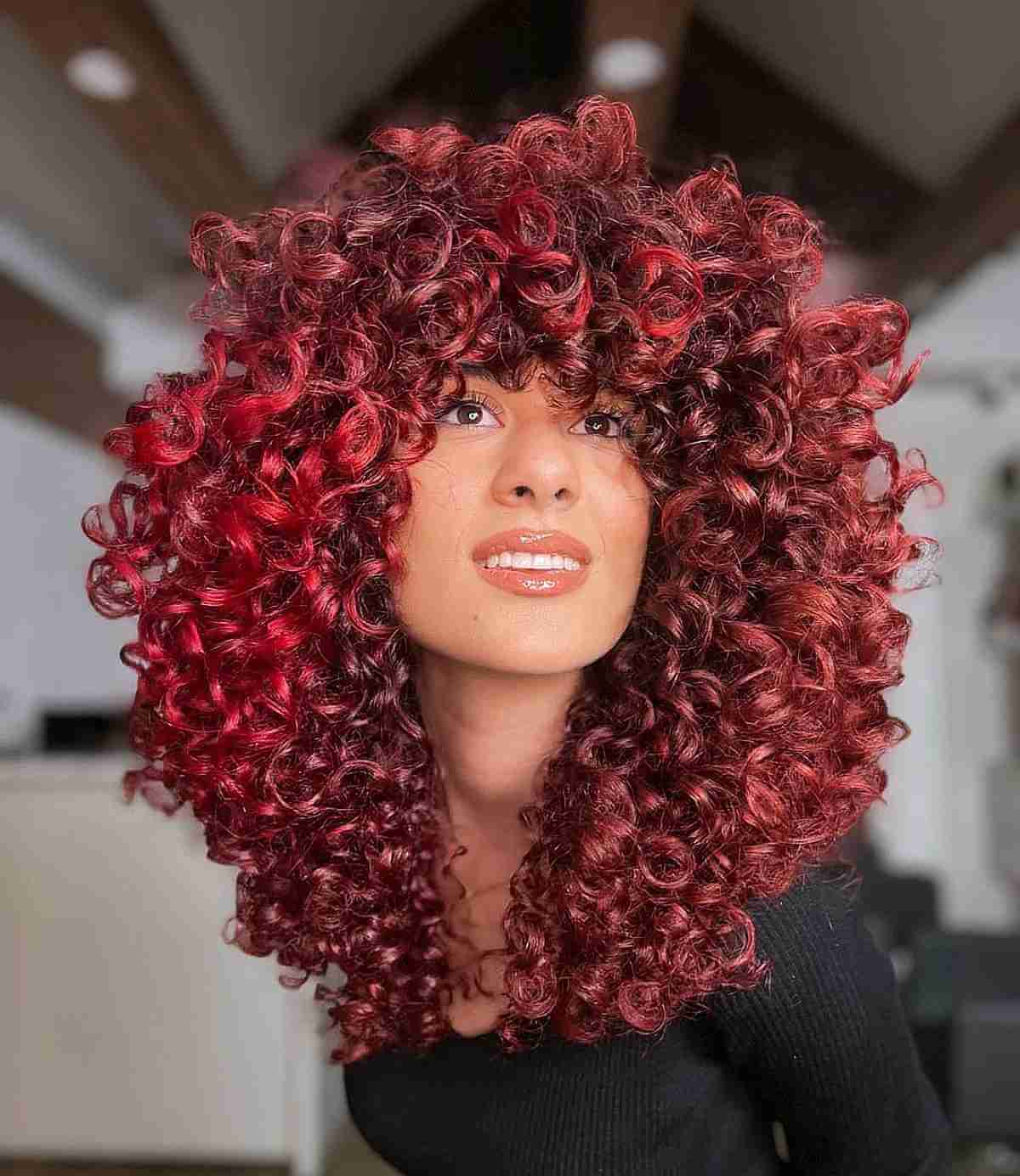 Naturally curly red shoulder length hair