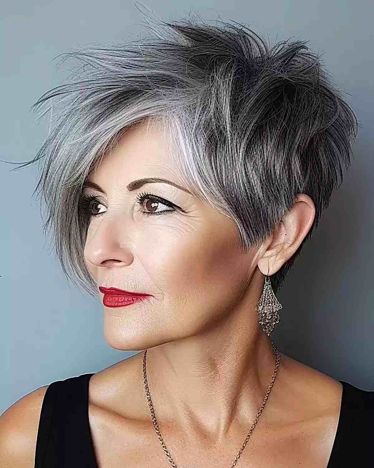 Naturally Gray Spiky Long Pixie for a Lady Aged 60
