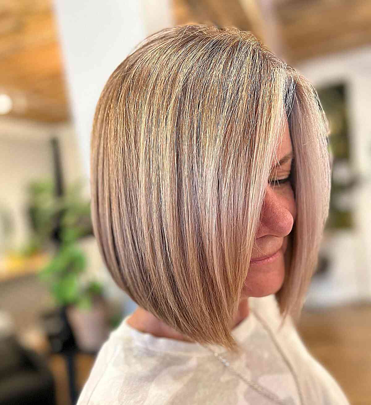 Neck-Grazing Side Part Blonde Balayage Bob for 50-year-old women and older