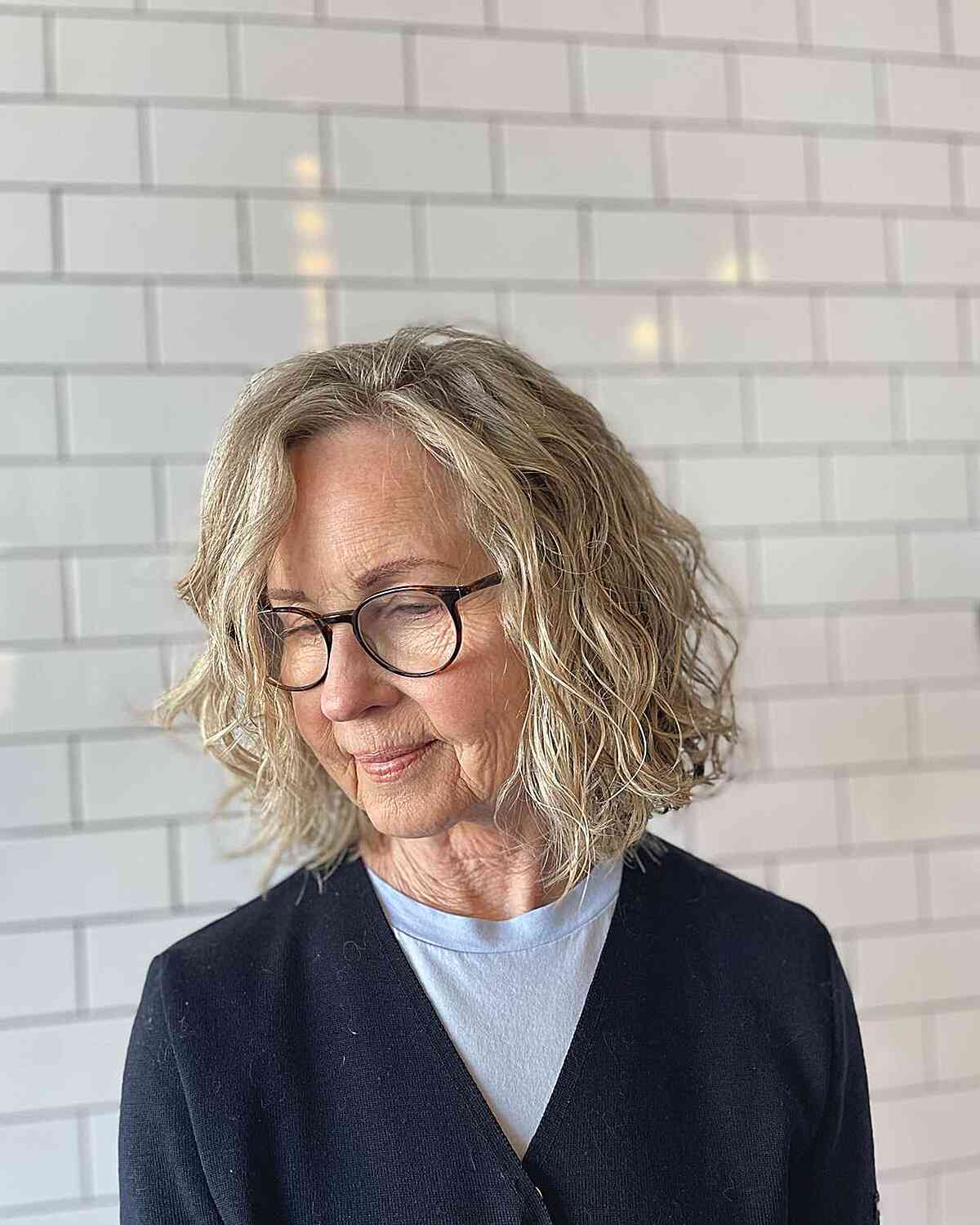 Neck-Grazing Textured Wavy Bob for Senior Women Aged 60 with Specs