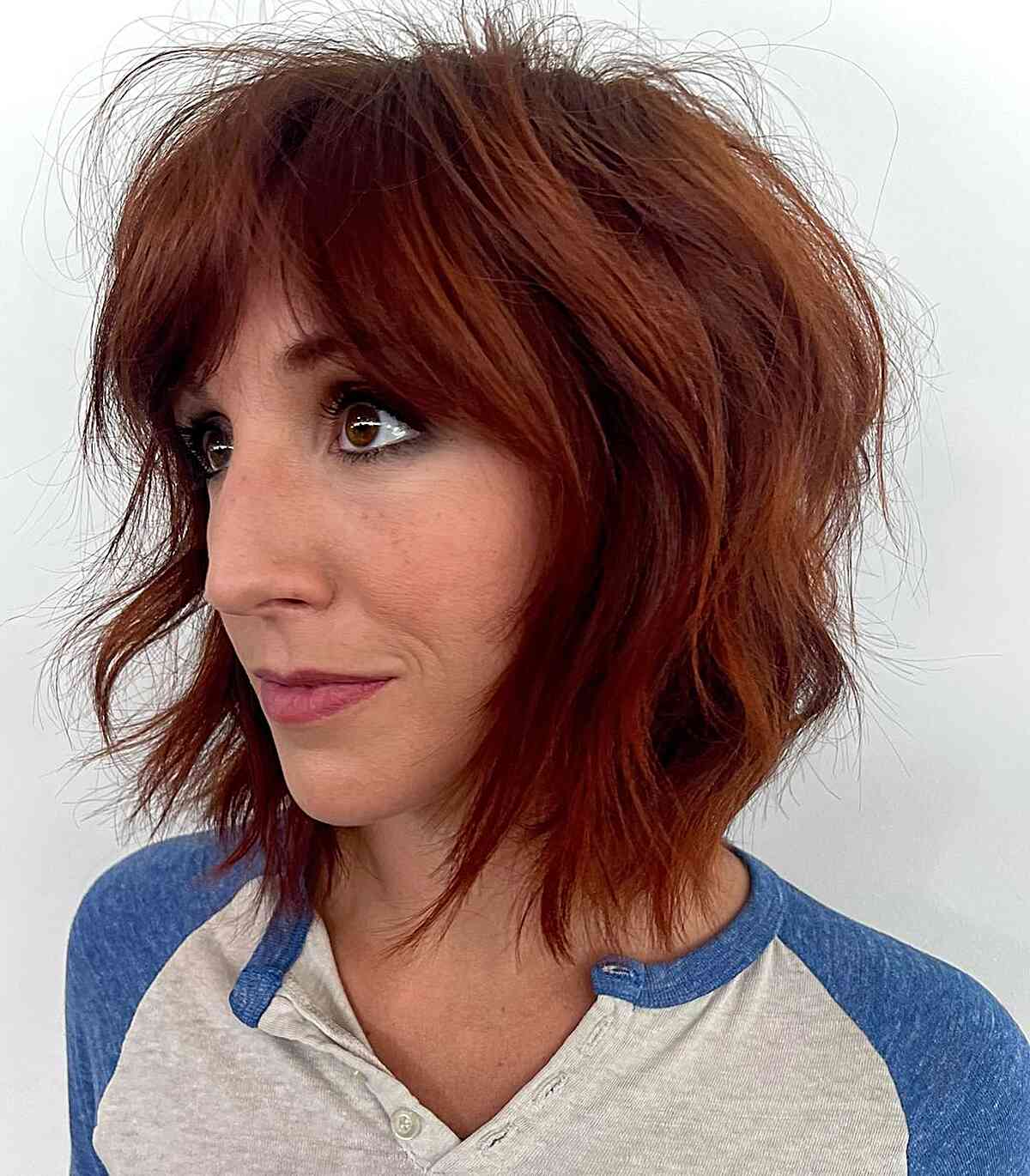 Neck-Length Choppy Shag Bob with Side-Parted Bangs