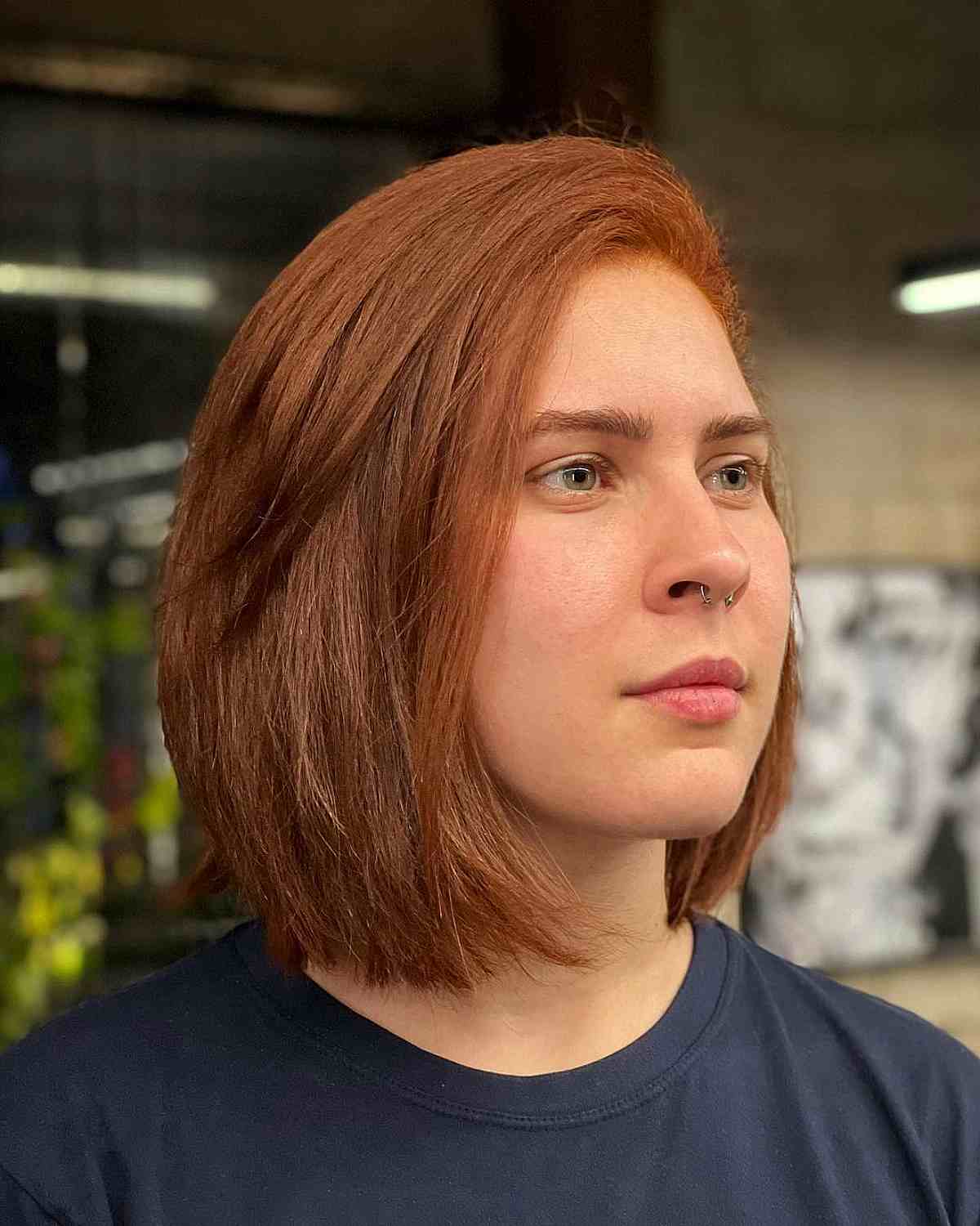 Neck-Length Copper Blunt Bob with a Deep Side Part