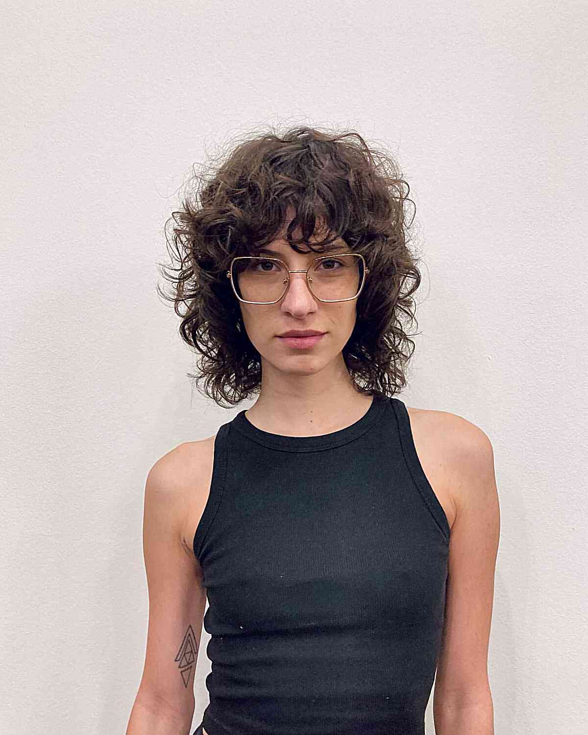Neck-Length Curly Shag Lob with Bangs