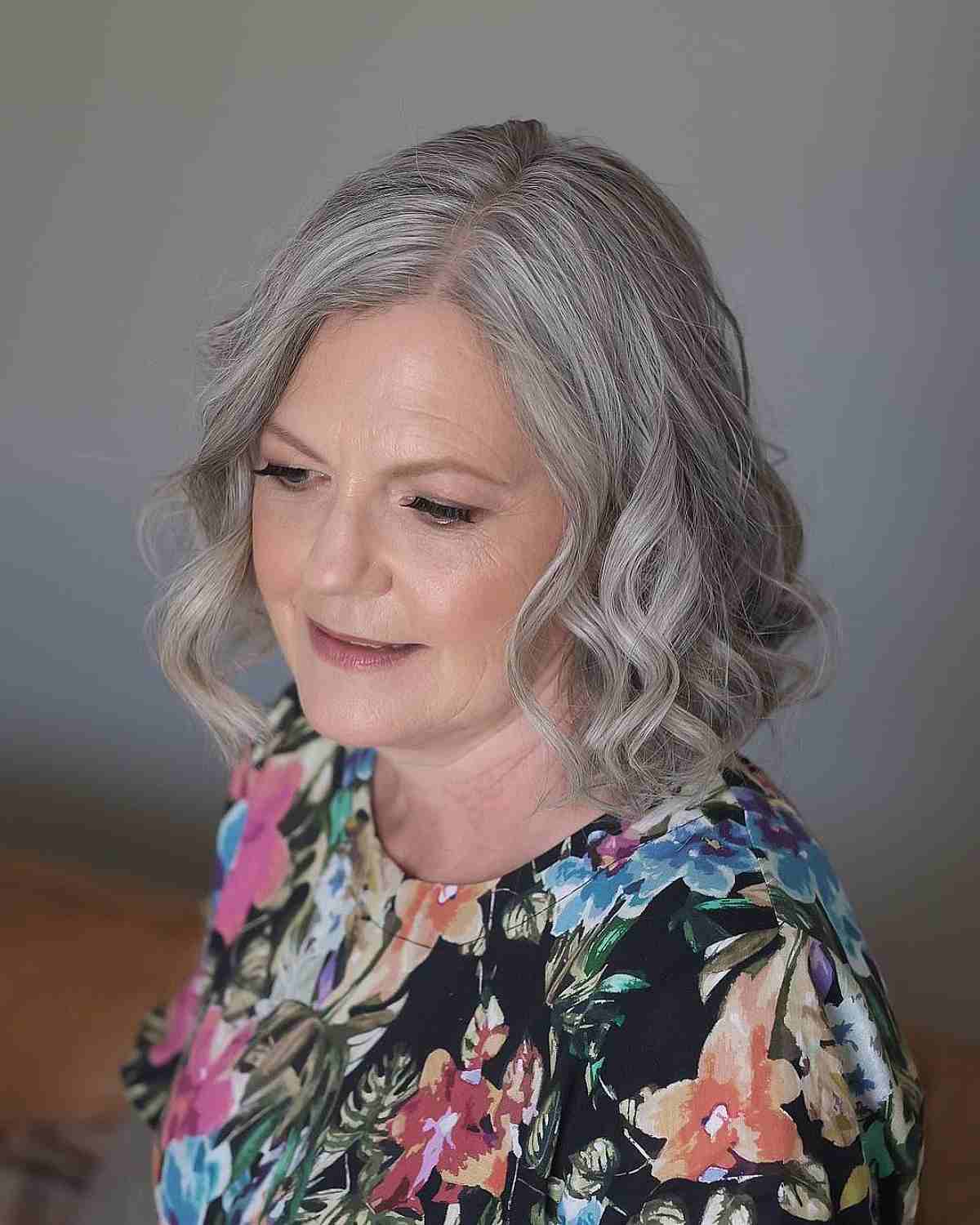 Neck-Length Cut with Soft Curls for a 50-Year-Old Lady