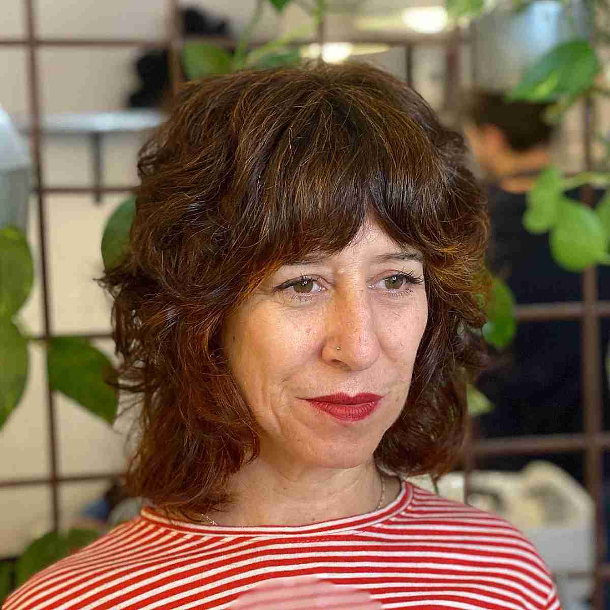 Neck-Length Shaggy Bob with Layers and Full Bangs for Women Over 60