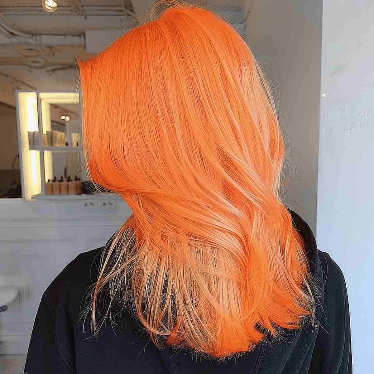 Noticeable Neon Peach Orange Hair Color
