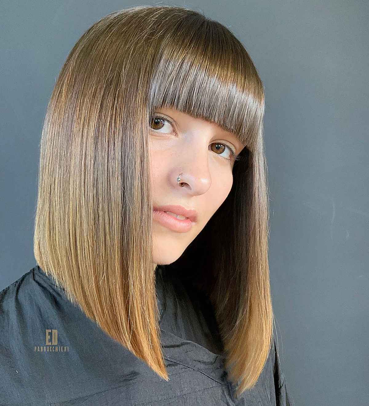noticeable long angled bob with bangs