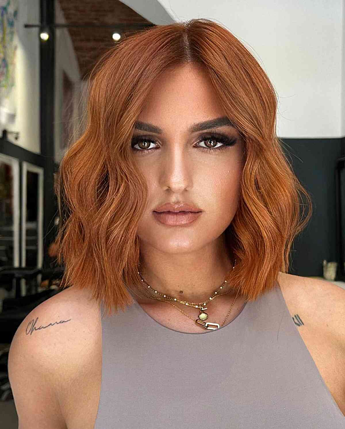Off-Centered Bob with Dusted Ends for Short Copper Hair
