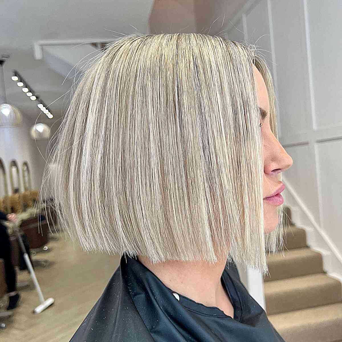 One-Length Blunt Bob with Scalp Foiling for ladies with a modern style
