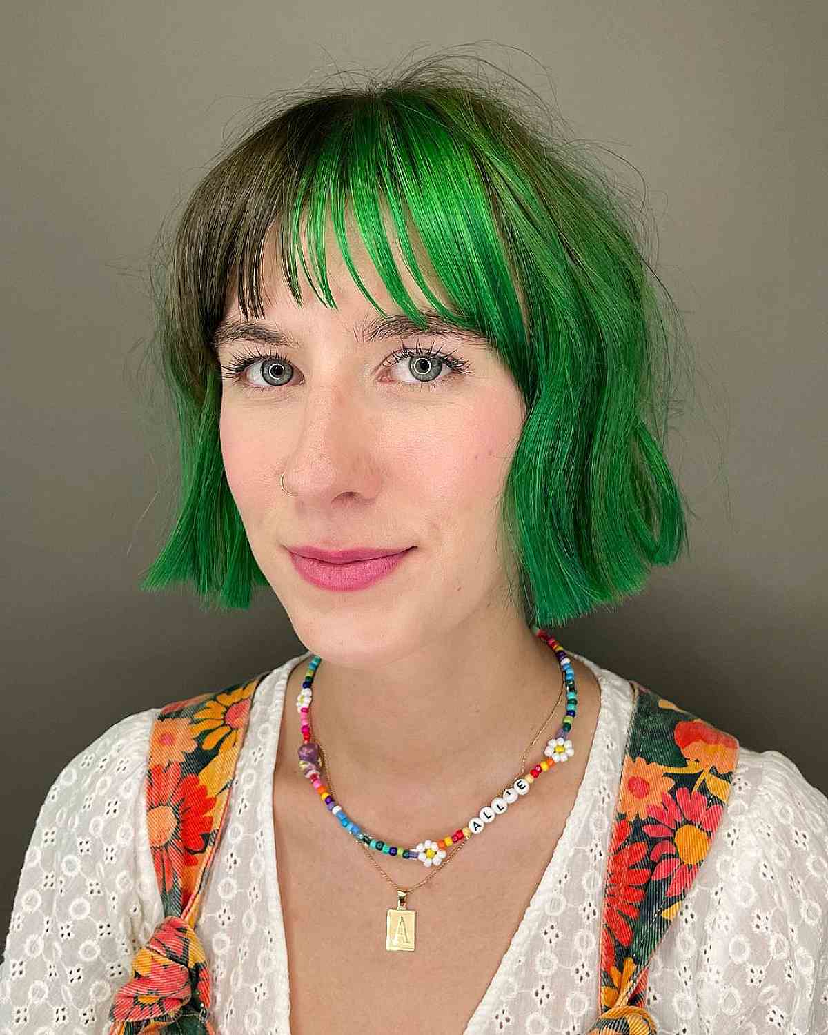 One-Length Bob with Piece-y Bangs on Short Green Chin-Length Hair