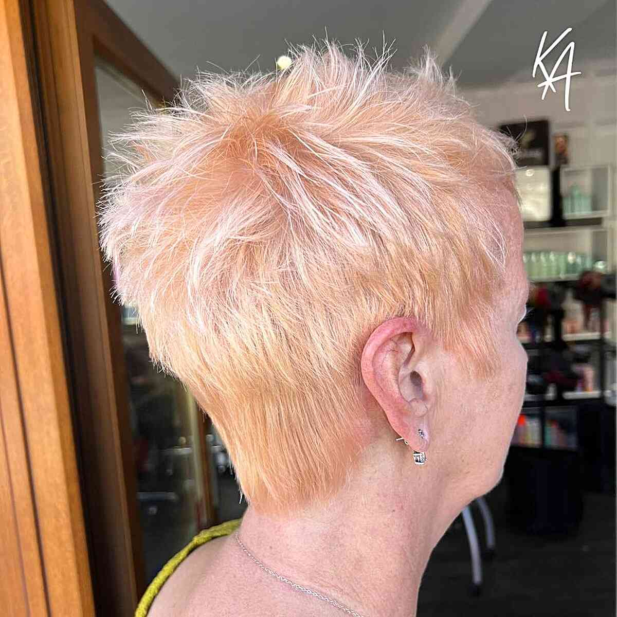 Pastel Copper with Short Choppy Cut on women in their 60s