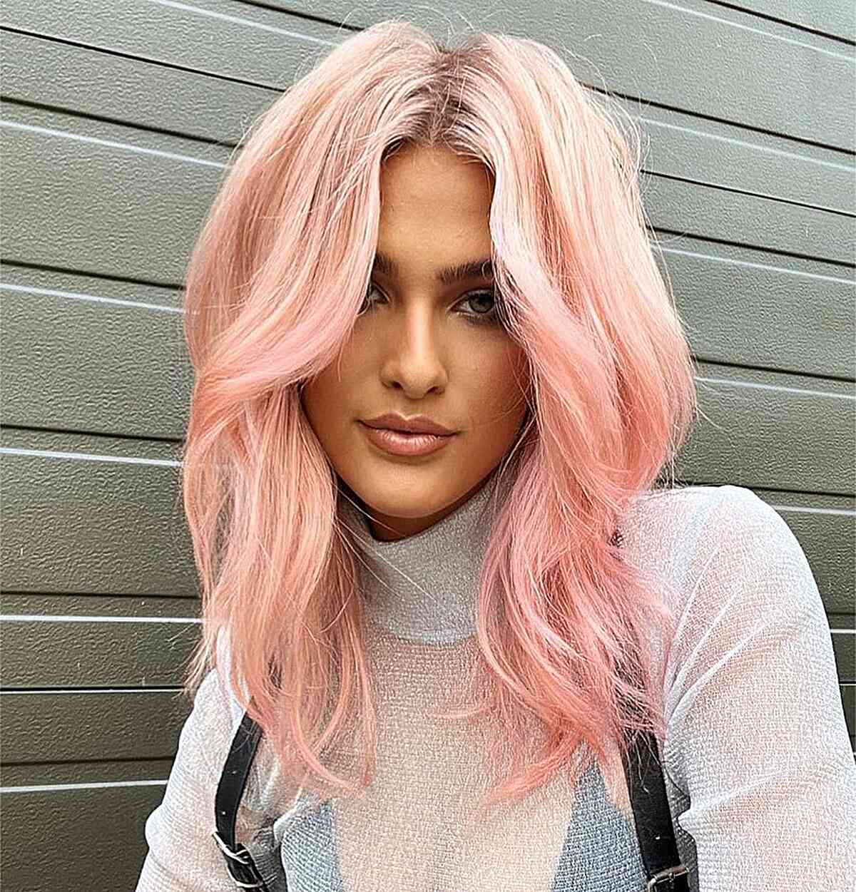 Pastel Pink Shaggy Hair with a center part for mid-length hair