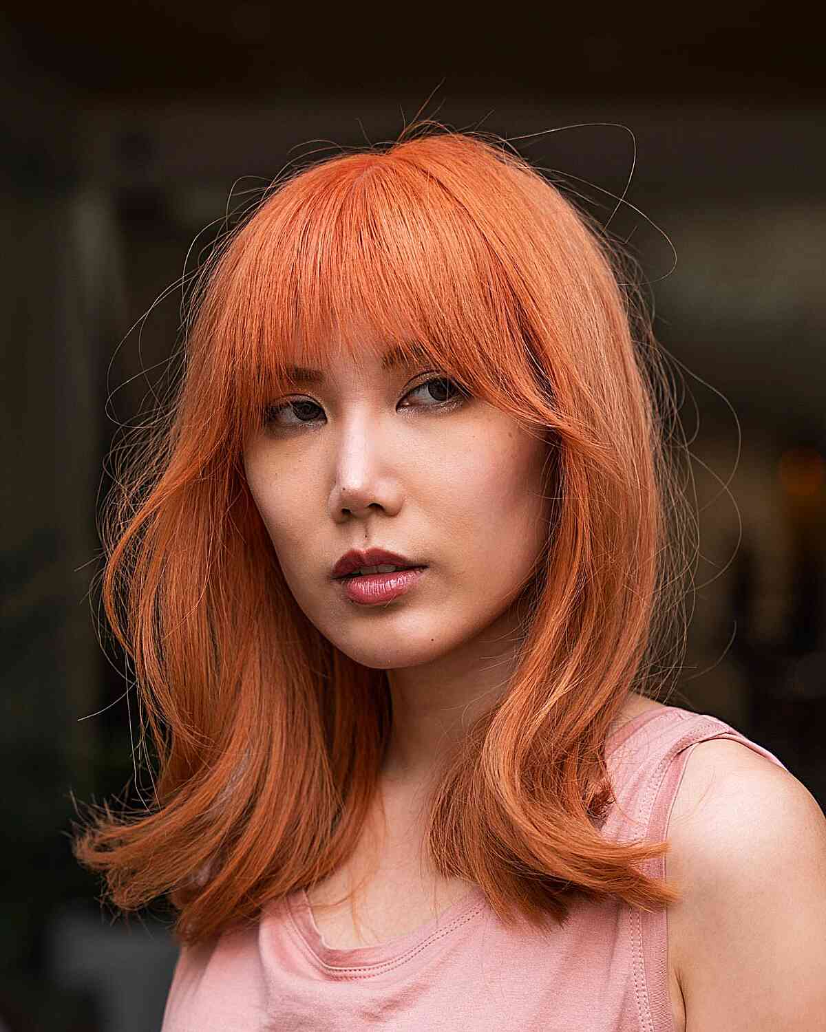 Peachy Color and Thin Fringe for edgy women with fine hair