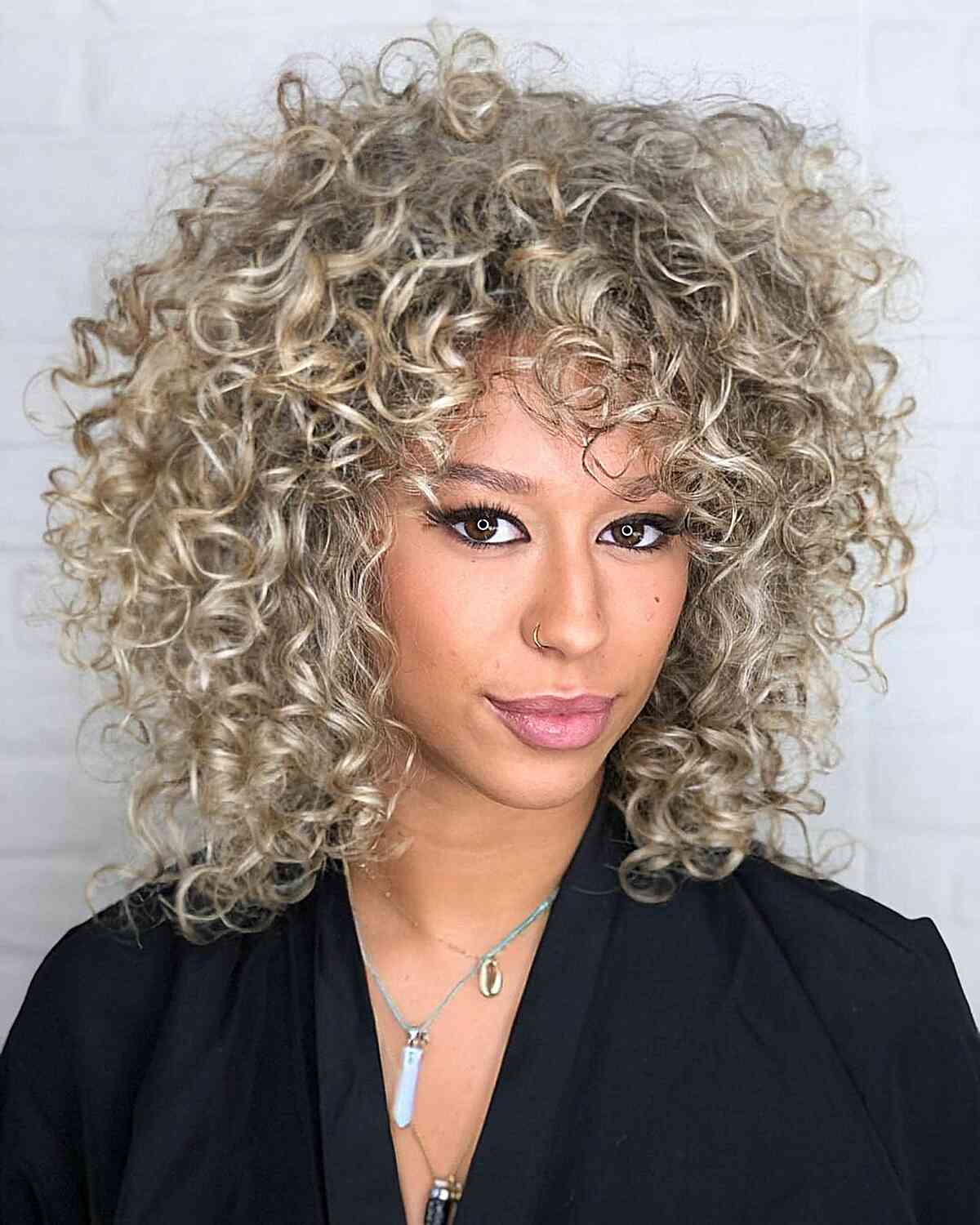 Pearly Blonde Curly Layered Hair