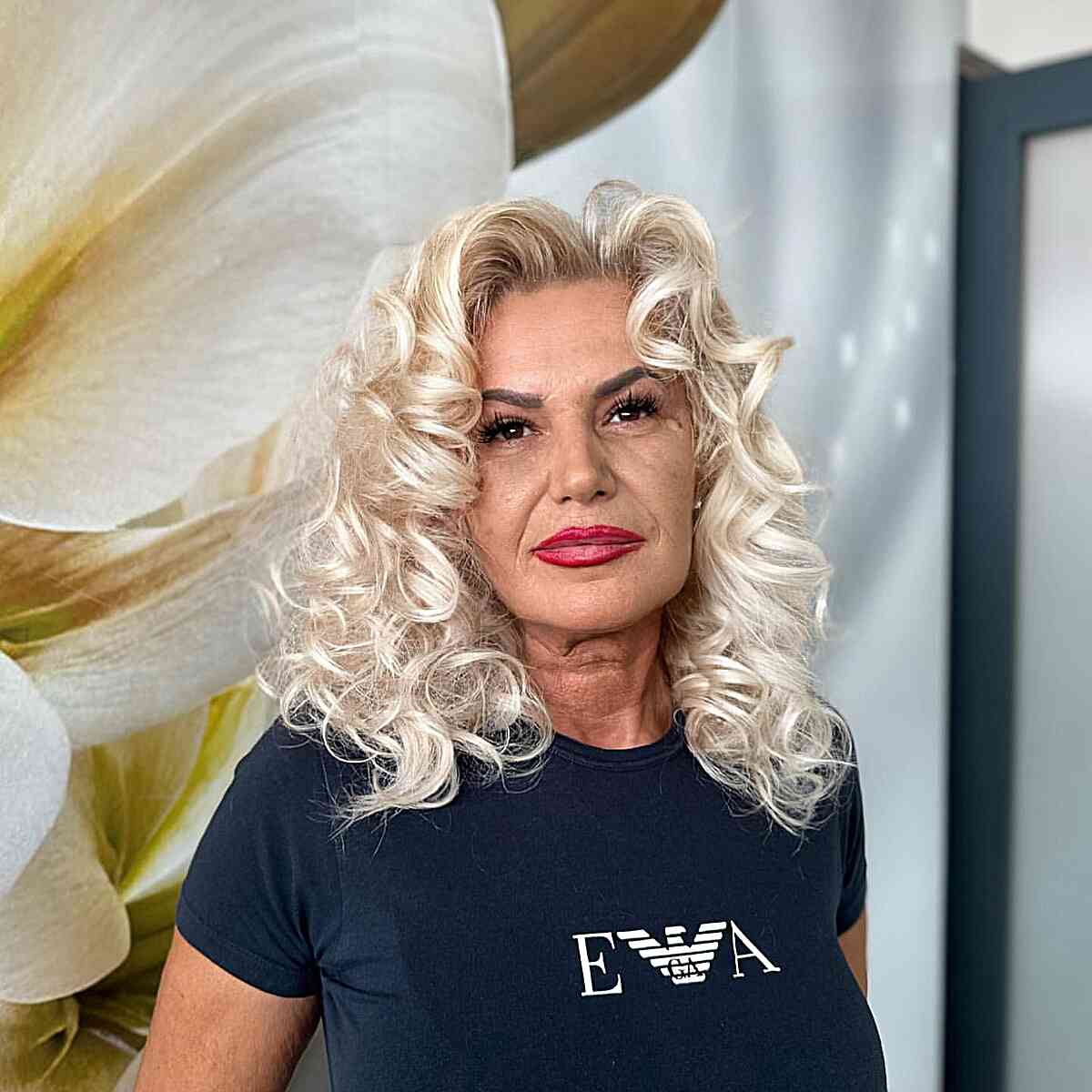 Perfect Mid-Length Light Blonde Curls for 50-Year-Old Women