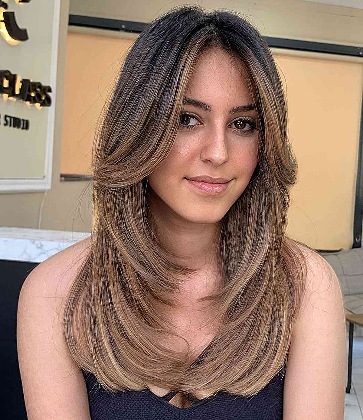 Perfectly Layered Straight Hairstyle with long curtain bangs