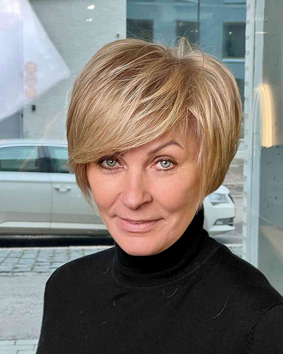 Perfectly Rounded Bob with Sweeping Fringe for blonde hair ladies over 50
