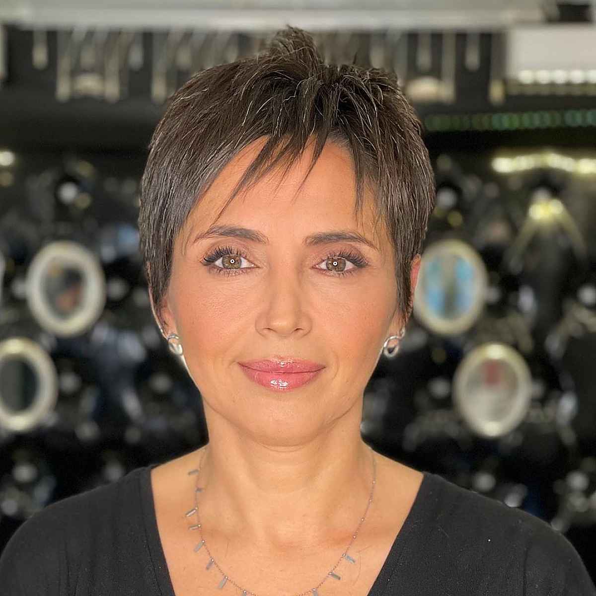 perfectly trendy long pixie cut for ladies past 40