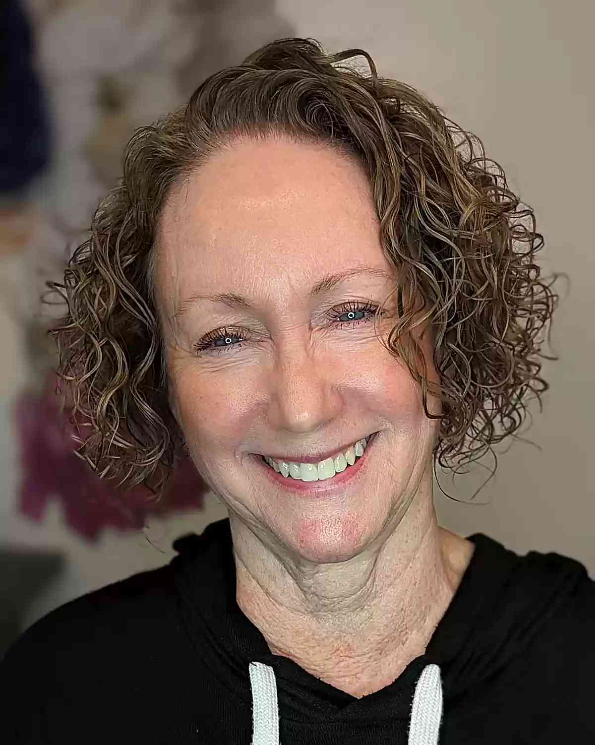 No-Bangs Permed Curls on Jaw-Length Haircut for Women Over 60