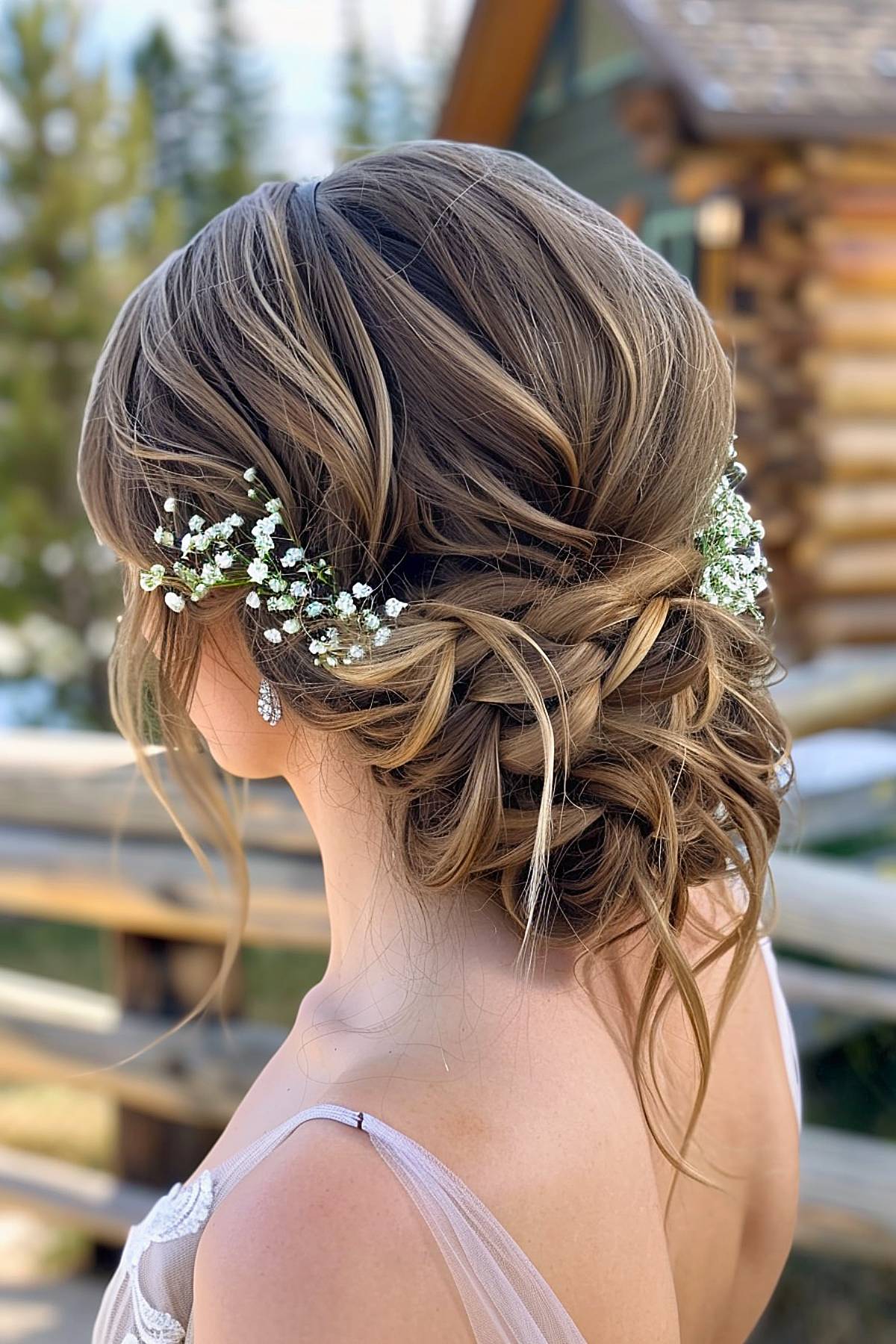 Petalwave updo with cascading twists and baby’s breath accents