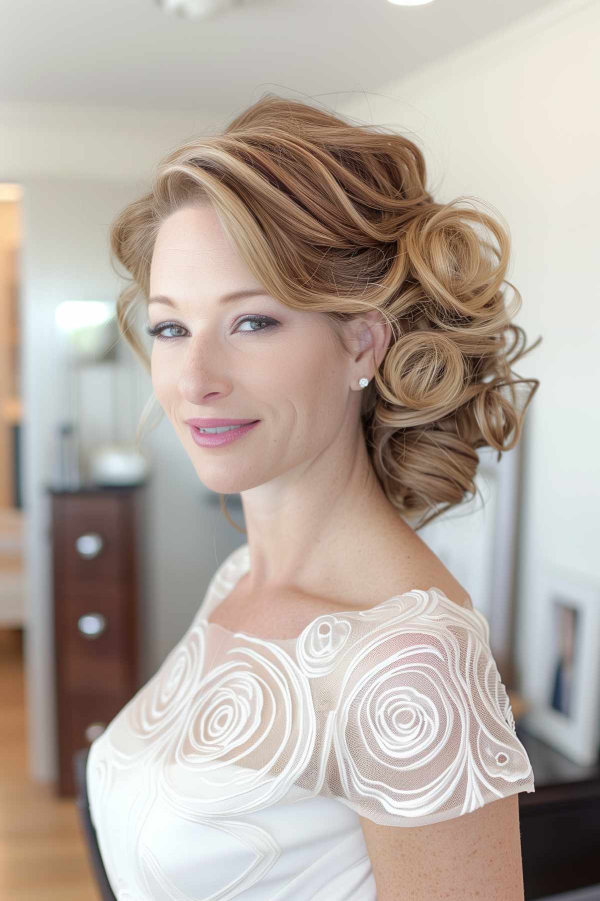 Sophisticated upstyle with meticulously sculpted pin curls and waves, ideal for a formal wedding or event.