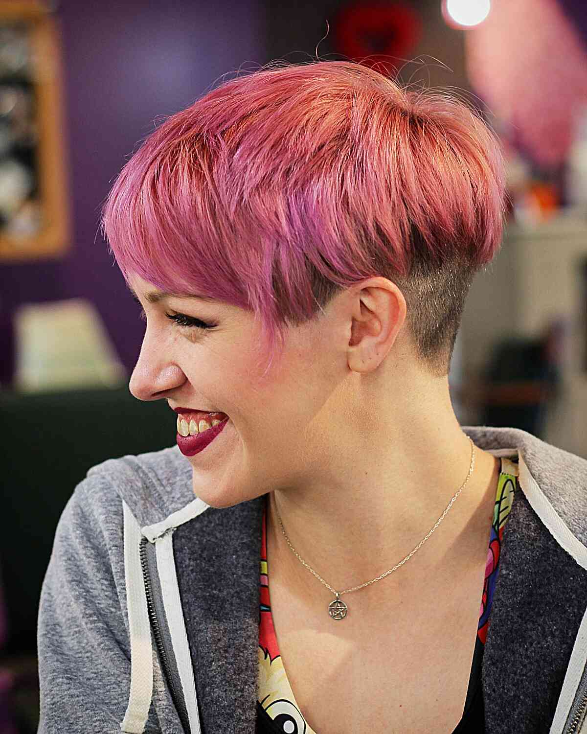 Pink Bixie with an Undercut and Bangs for women with an edgy style