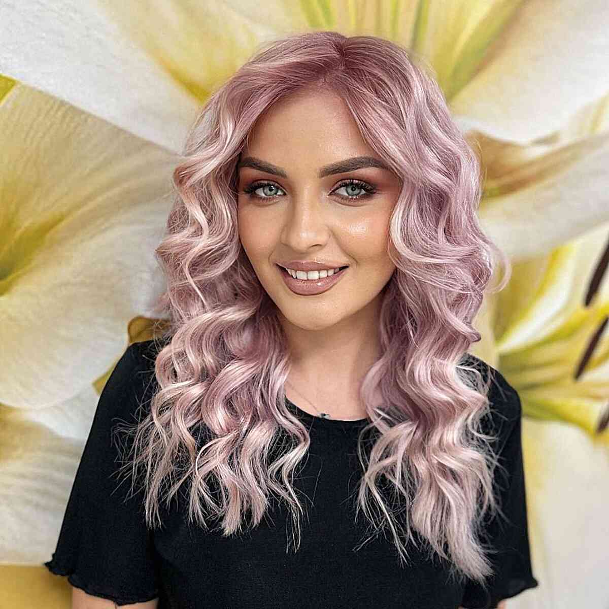 Pink Curled Mid-Length Haircut for women with diamond face shapes