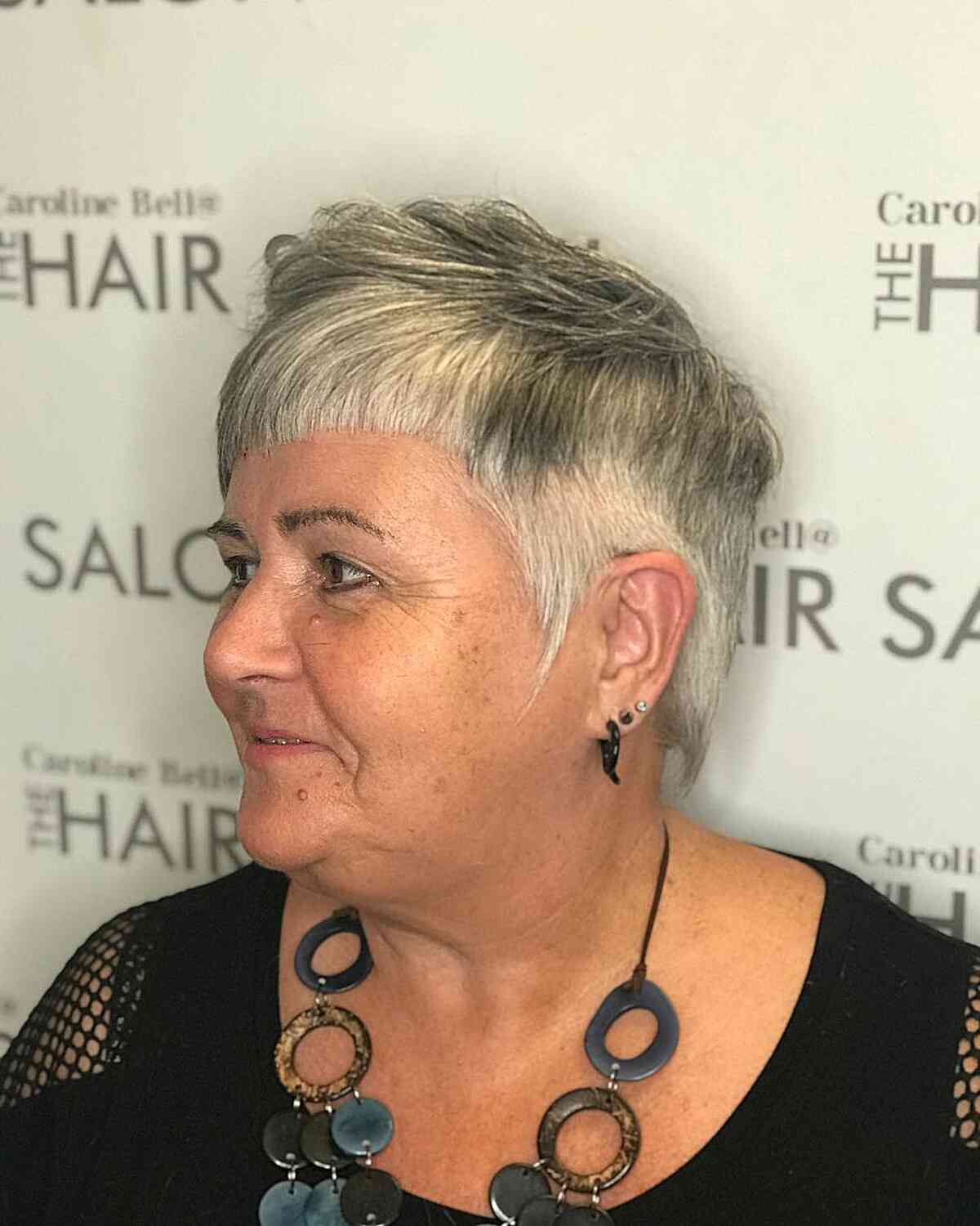 Pixie Crop with Short Bangs on Ladies Over 60 with Fuller Faces