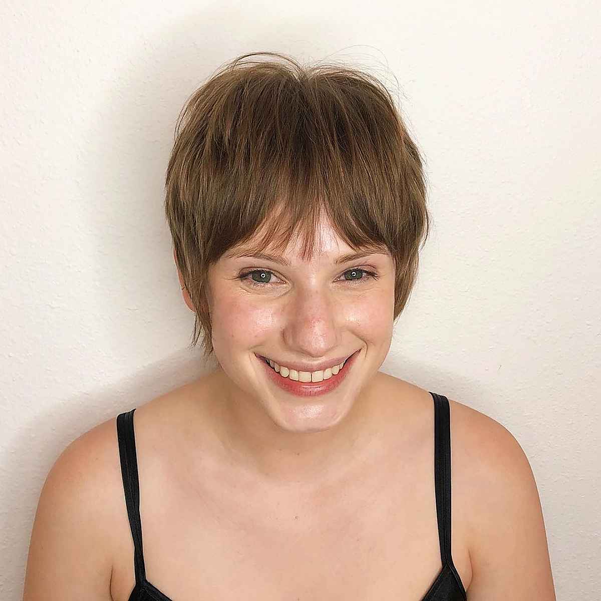 Short Layered Hair with Curtain Bangs for Women Over 40