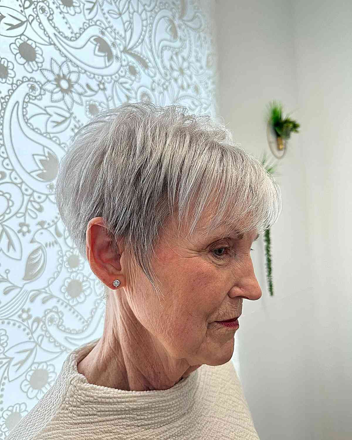 Pixie with Choppy Layers and Sideburns for Ladies Aged 70