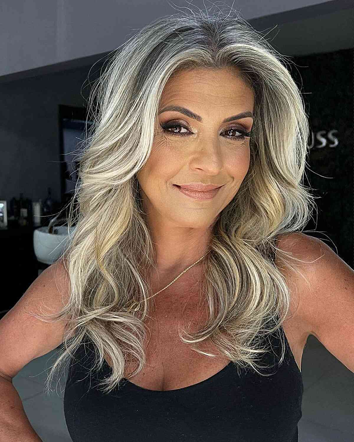 Platinum Blonde Balayage Blowout for women with thick mid-length hair