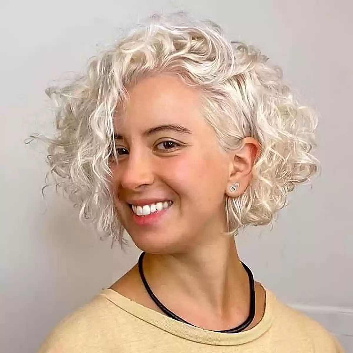Platinum Bright White Curly Bob for women with voluminous curls