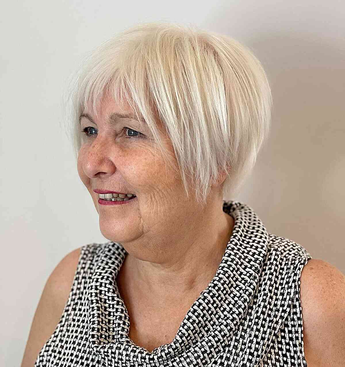 Platinum Long Pixie with Choppy Bangs for Women Aged 70