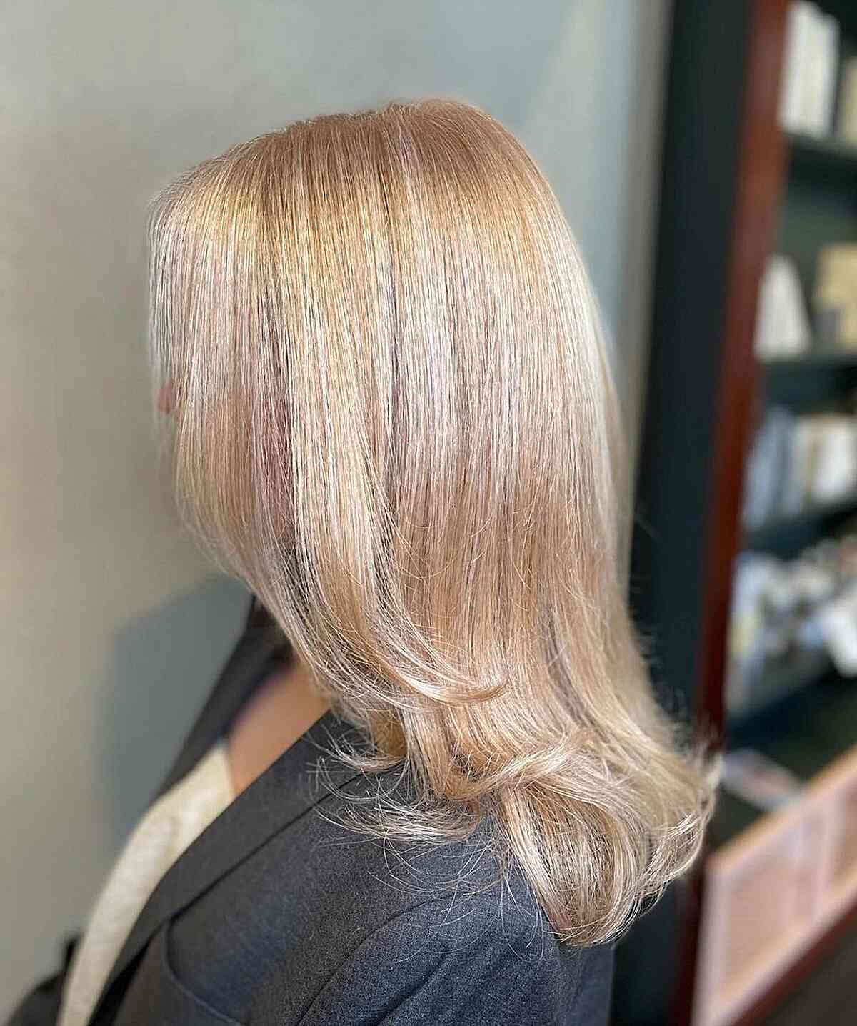 Platinum Strawberry Blonde Balayage Hair with Medium Layers