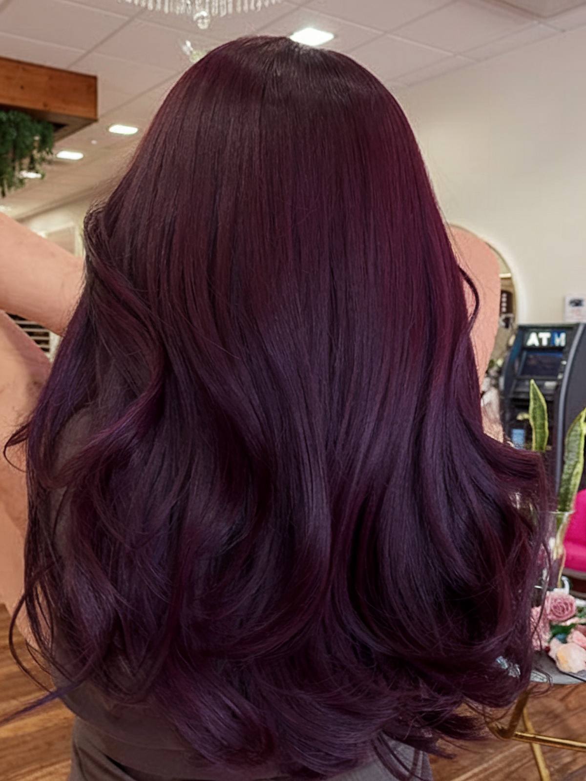 Plum wine hair shade on long, thick hair