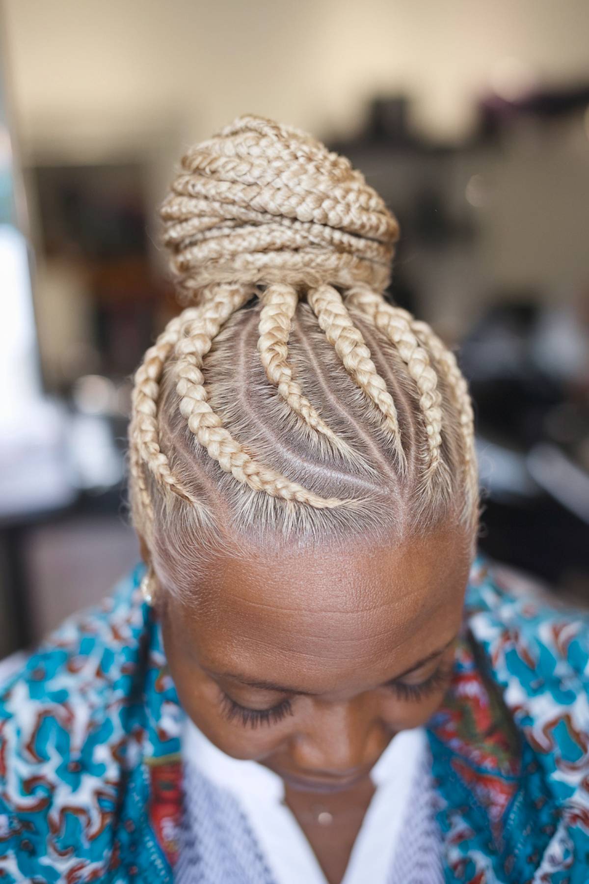 Blonde braided protective style for Black women over 60