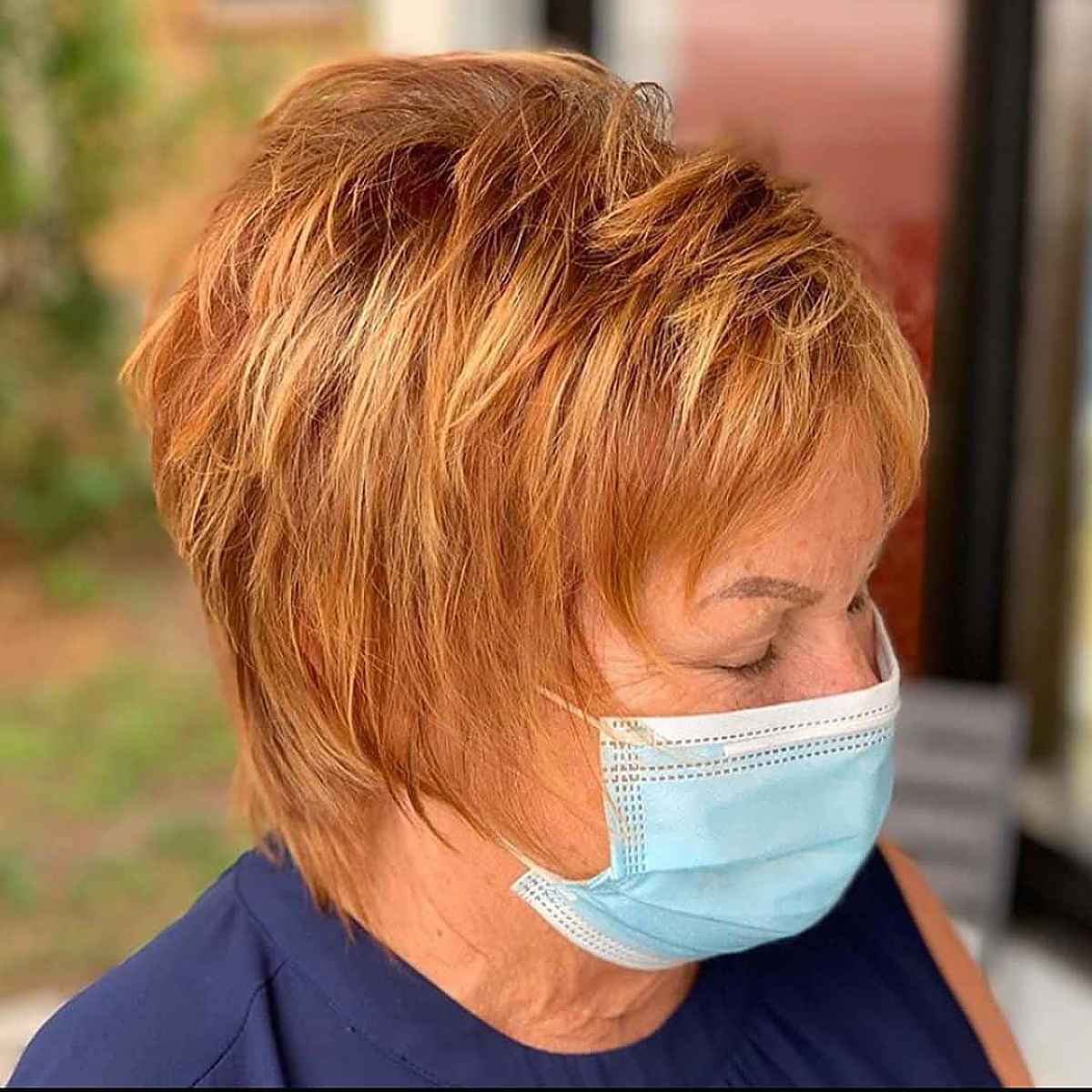 Pixie Cut with Pumpkin Spice and Blonde Highlights fall hair color for elderly lady