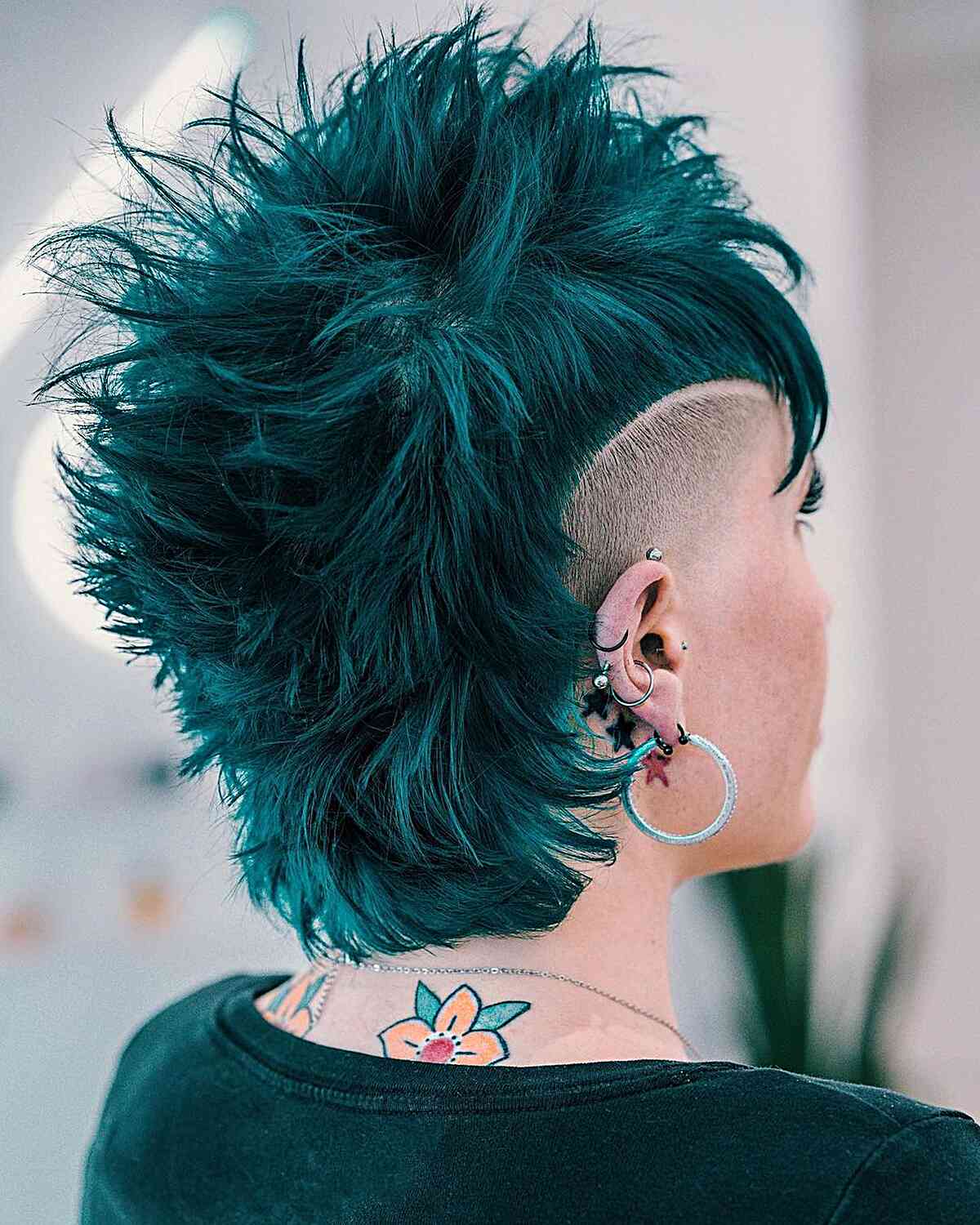 Punk Edgy Green Mullet with a Skin Fade Hairstyle for Women